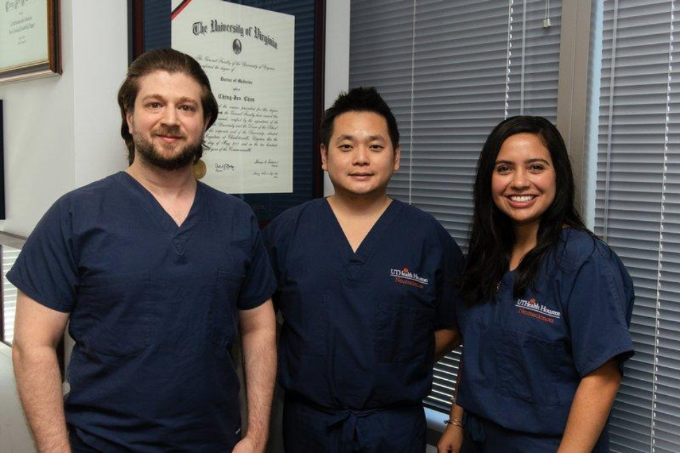 Chen with his research collaborators. To his left, Faris Shaker, MD, and to his right, Andrea Becerril Gaitan, MD, both with the Department of Neurosurgery at McGovern Medical School. (Photo by David Sotelo/UTHealth Houston)